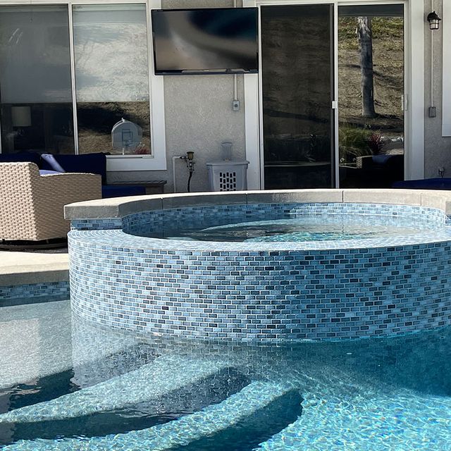 Safety in Style: Pool Step Tile and Pool Tiles That Guarantee Both Beauty and Security